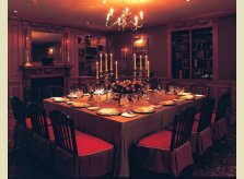 Private Dining room with dado height panelling, bookcase